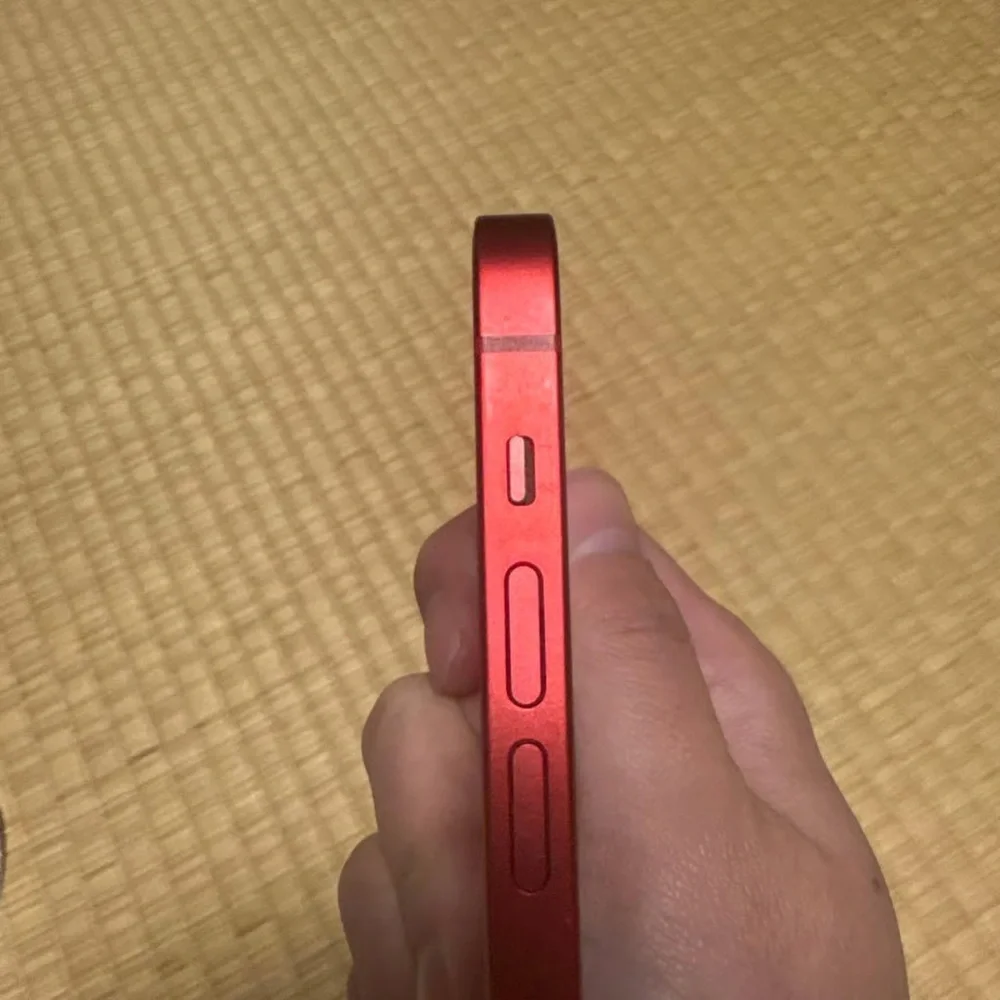 Apple Smartphone in Red with Blue Display